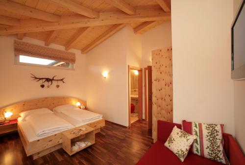 Una cama o camas en una habitación de Aparthotel Waidmannsheil