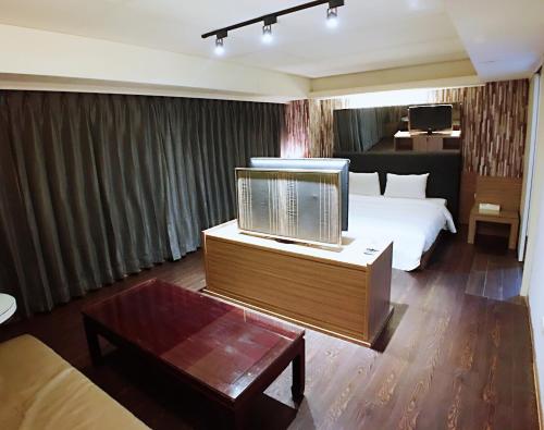Postel nebo postele na pokoji v ubytování Love Hotel