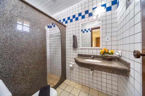 Koupelna v ubytování Hotel Fênix