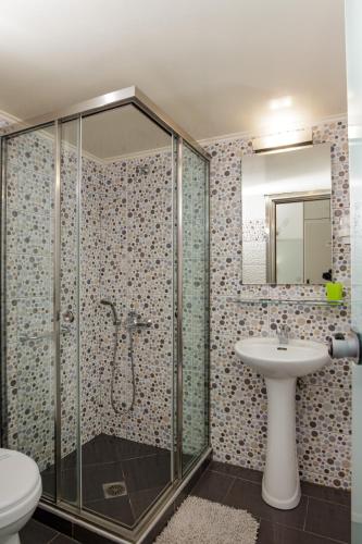 Un baño de Hotel Ideon