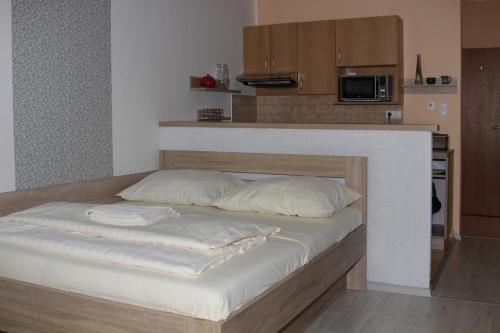 Posteľ alebo postele v izbe v ubytovaní Studio Hrabovo 203 Fatrapak 2