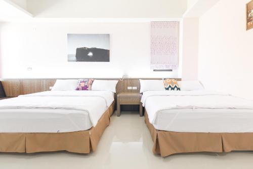 Postel nebo postele na pokoji v ubytování 5+1 Homestay