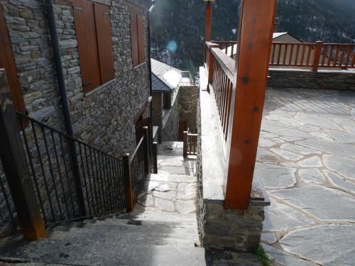 a balcony of a building with a fence and a porch at Ransol - El Tarter in Ransol