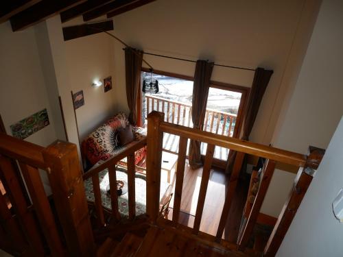 an overhead view of a room with a staircase and a window at Ransol - El Tarter in Ransol