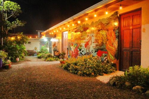 a building with lights on the side of it at night at Casa Jungle Monteverde B&B in Monteverde Costa Rica