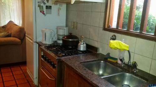 Кухня или мини-кухня в Casa En El Bosque
