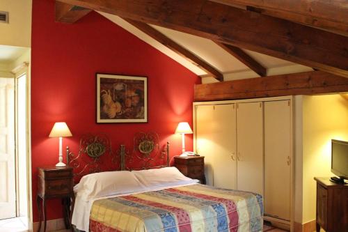Postel nebo postele na pokoji v ubytování Albergo delle Drapperie
