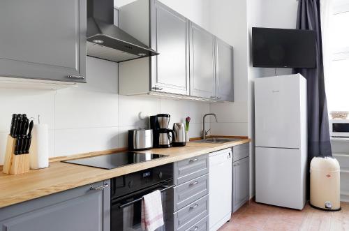Küche/Küchenzeile in der Unterkunft Apartment BLISSE Large & Cozy Family & Business Flair welcomes you - Rockchair Apartments