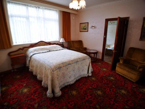 Katil atau katil-katil dalam bilik di Motel Mayfair on Cavell