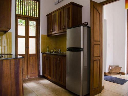 Kuchyň nebo kuchyňský kout v ubytování Villa Tara
