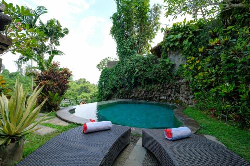 The swimming pool at or close to Sunrise Villa Ubud