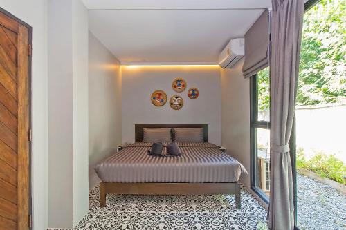 Cama o camas de una habitación en JN9 POSHTEL