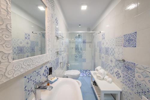 Koupelna v ubytování QuattroCuori Boutique Hotel & Spa