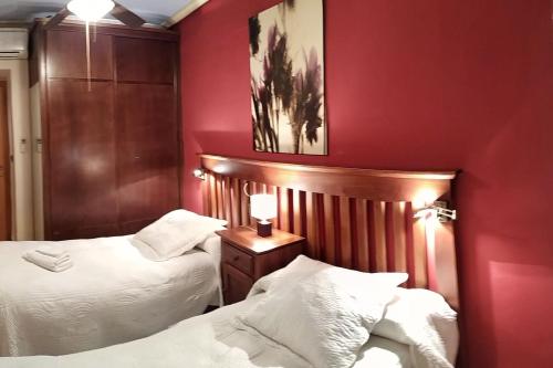 Postel nebo postele na pokoji v ubytování -3-COMO EN CASA, en centro historico de Ubeda