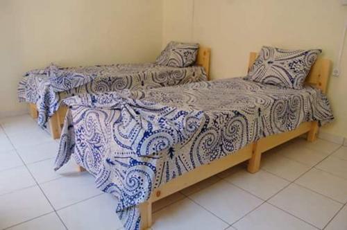 מיטה או מיטות בחדר ב-casa xoxo