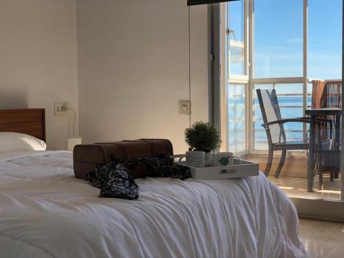 Ένα ή περισσότερα κρεβάτια σε δωμάτιο στο Stunning Sea View