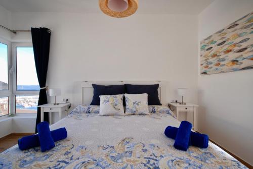 En eller flere senger på et rom på Sea Lovers Jacuzzi Fuerteventura