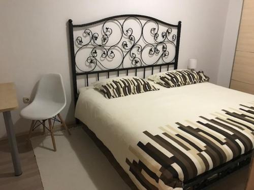 Ένα ή περισσότερα κρεβάτια σε δωμάτιο στο Apartment Bruno - parking included