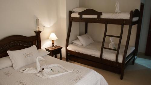 Ліжко або ліжка в номері Hotel Sipa