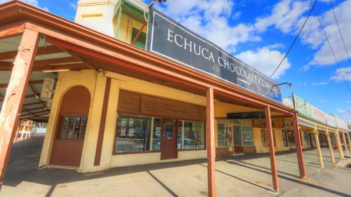 a building with a sign on the front of it at Moama Central Motel in Echuca