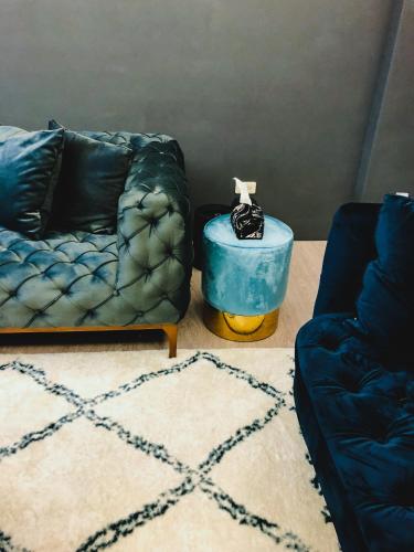 a living room with a couch and a table at Chloechen Home in Taitung City