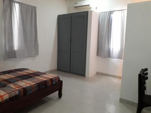 מיטה או מיטות בחדר ב-La Maison Blanche