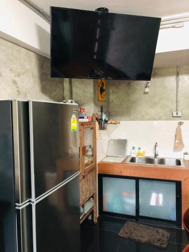 Η κουζίνα ή μικρή κουζίνα στο Baan Lung Poshtel
