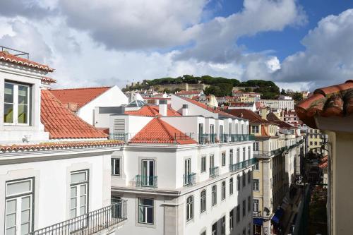 a view of a city with white buildings at My Story Hotel Ouro in Lisbon