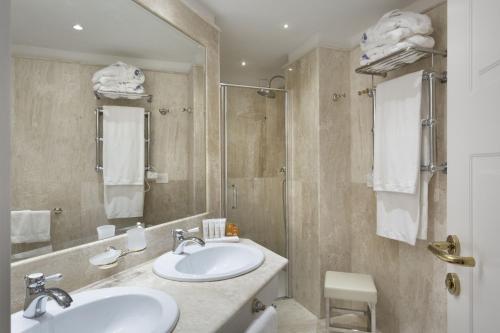 Ванная комната в Hotel Abi d'Oru