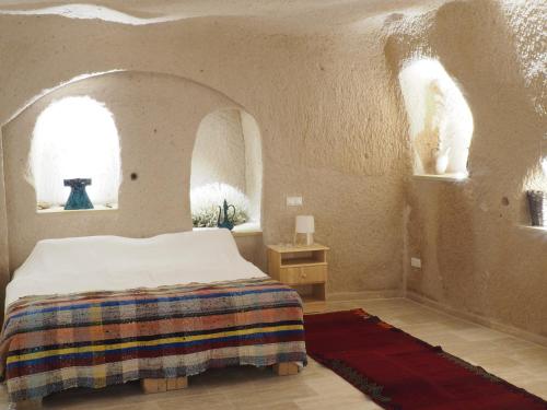 Maze Of Cappadocia Hotelにあるベッド