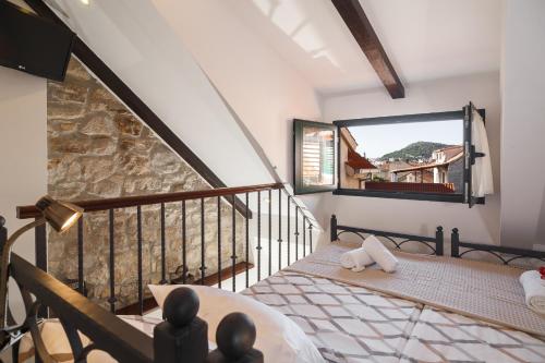Кровать или кровати в номере Apartments Villa Cambi