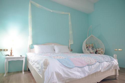 Katil atau katil-katil dalam bilik di Flying in Sunny Day B&B