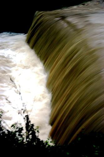 a close up view of a raging river at La Casina in Stia