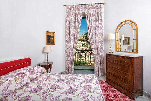 Ένα ή περισσότερα κρεβάτια σε δωμάτιο στο Palazzo Margherita