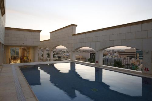 The swimming pool at or close to IntercityHotel Riyadh Malaz