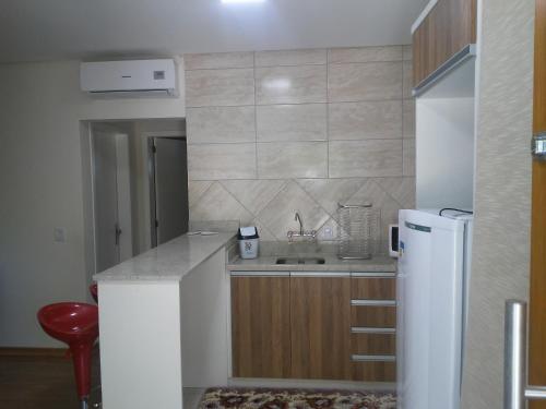 Dapur atau dapur kecil di Apartamentos Zidane