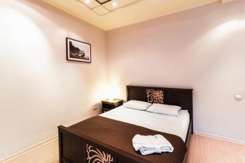 Cama o camas de una habitación en Apartament "Berloga 55" on Frunze