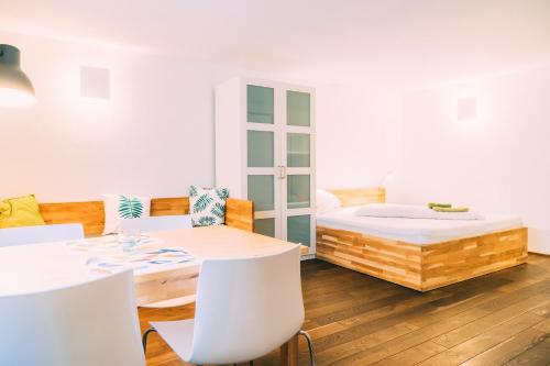 Postel nebo postele na pokoji v ubytování Stadthaus Gut Hügle