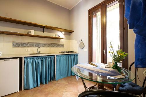 Η κουζίνα ή μικρή κουζίνα στο Solemar Sicilia - Casa Maria