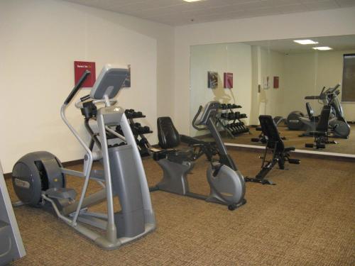 a gym with treadmills and ellipticals in a room at MainStay Suites Coeur d'Alene in Coeur d'Alene