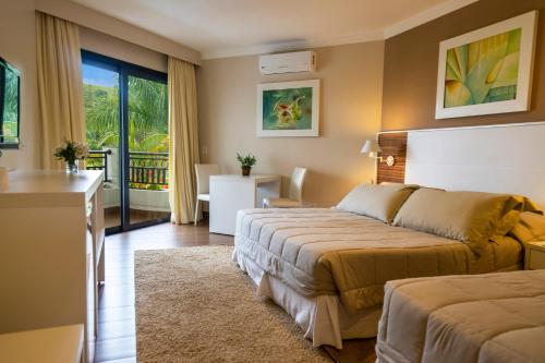 Postel nebo postele na pokoji v ubytování Vale Suíço Resort