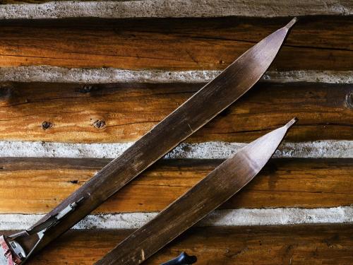two old knives sitting on top of a wooden wall at Ski Tip Lodge by Keystone Resort in Keystone
