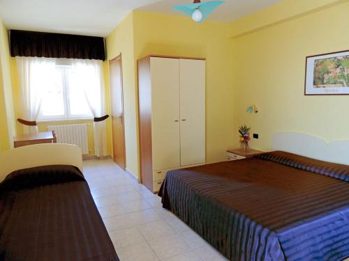 Postel nebo postele na pokoji v ubytování B&B Angela