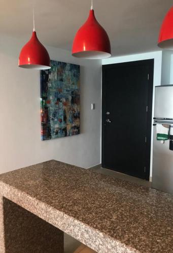 Una cocina o cocineta en Lindo Departamento al pie de playa Edificio TORRE OCEÁNICA