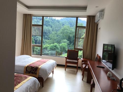 Imagen de la galería de Mount Emei Feng Lin Yue Hotel, en Emeishan