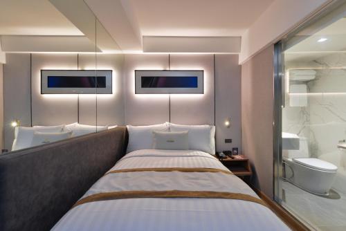 Кровать или кровати в номере Syama Nana