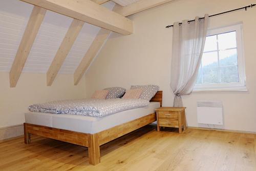 Een bed of bedden in een kamer bij Villa Jana