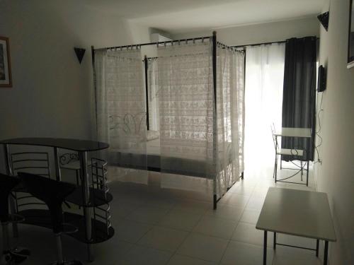 Postel nebo postele na pokoji v ubytování Residencial Casa da Luz