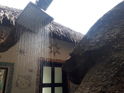 a building with icicles on the side of it at Lighthouse Bungalows in Haad Rin