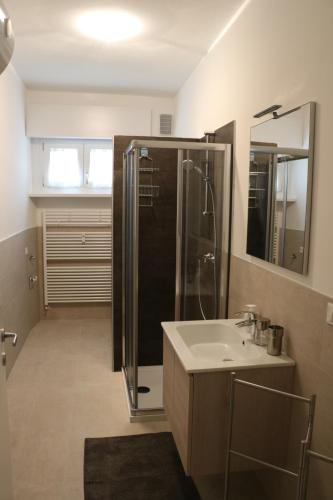 a bathroom with a shower and a sink at CLESIO 2 in Trento